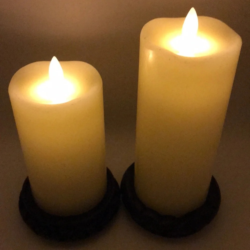 Pair of flameless real wax candles and holders
